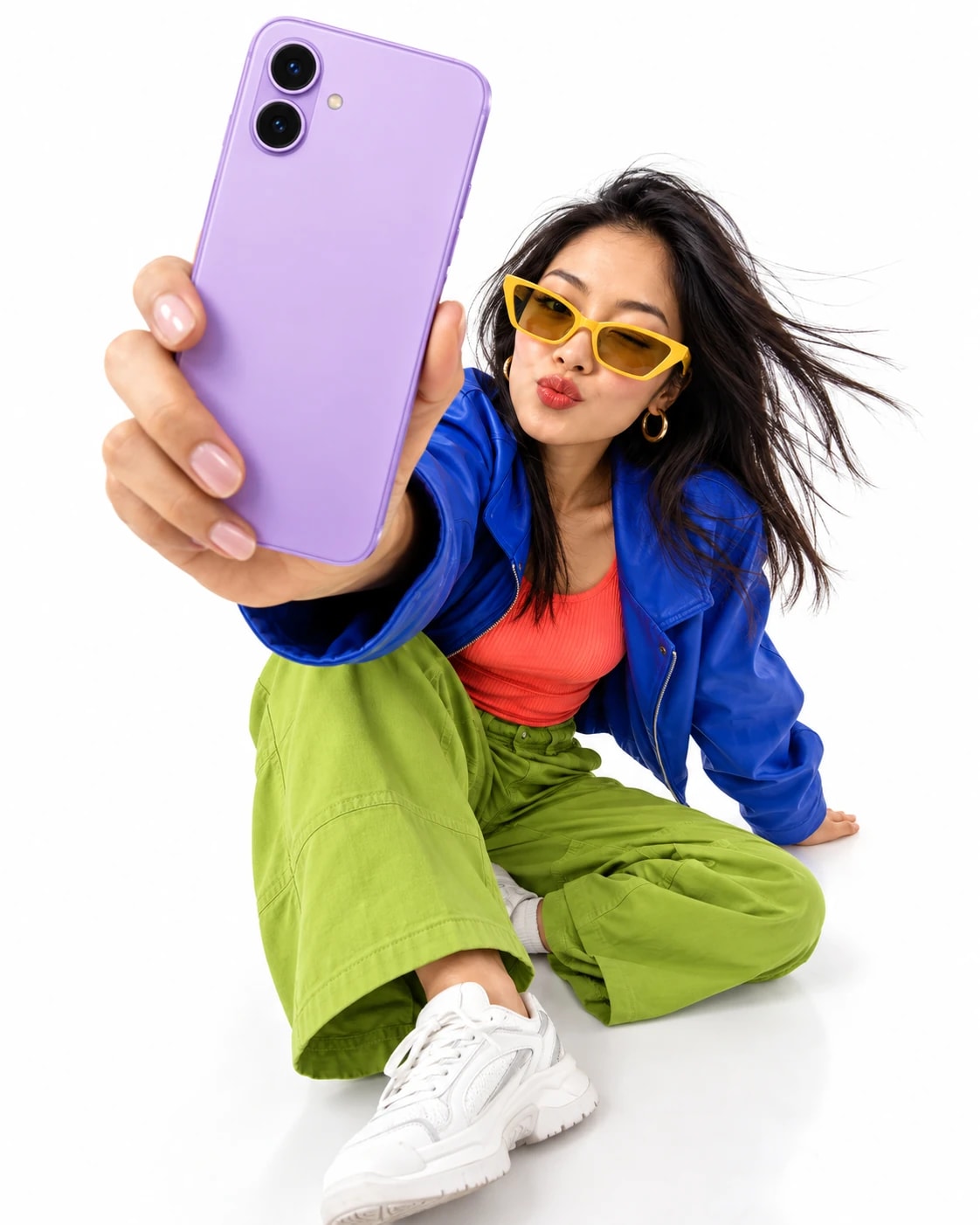 Fashion creator recording a shoppable post with a lavender phone